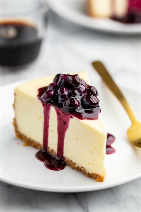 Slice Of Cheesecake Topped With Homemade Blueberry Sauce Blueberry
