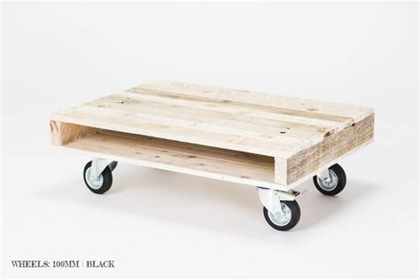 This piece measures 16.93'' h x 31.5'' l x 31.5'' w overall. 'on Wheels' Small Wood Coffee Table By Gas&Air Studios Ltd ...