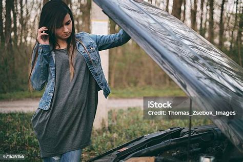 Woman Under The Hood Of Her Car Break Down Stock Photo Download Image