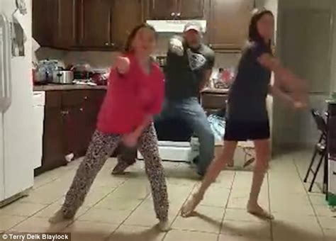 Father Of Two Girls Practising The Whipnae Nae Sneaks Up Behind Them