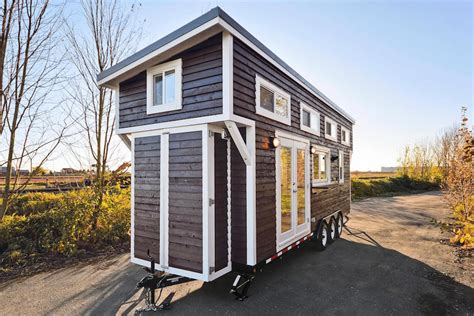 The first thing many people wonder when hearing about a tiny house is how do. Custom Mobile Tiny House With Large Kitchen And Two Lofts ...
