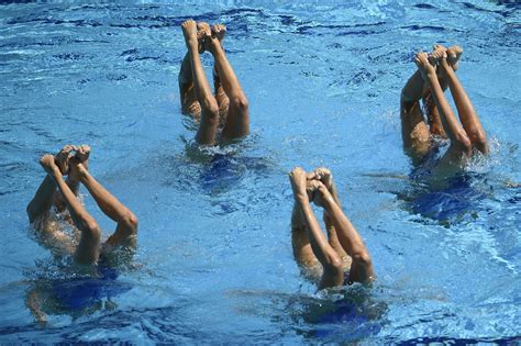 Stunning Photos From The Olympic Synchronized Swimming Finals