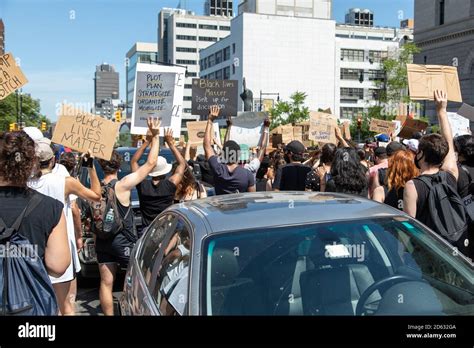 Crowd Of Protesters Holding Up Signs At Black Lives Matter March