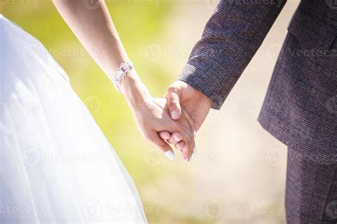 Romantic Couple Holding Hands Lovers Or Newlywed Married Young Couple In Romance Wedding Theme