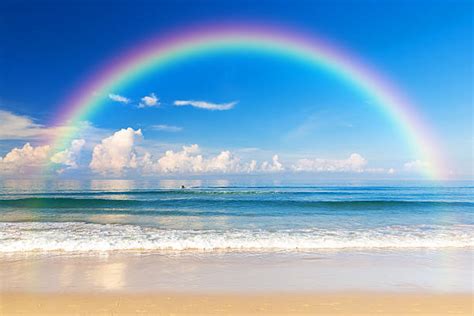 Rainbow On The Ocean Stock Photos Pictures And Royalty Free Images Istock