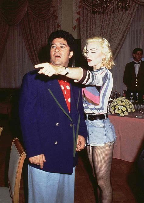 The definitive singles artist of the video age and a pop icon, one of the most commercially successful artists in music history. Madonna and Pedro Almodovar, 1990