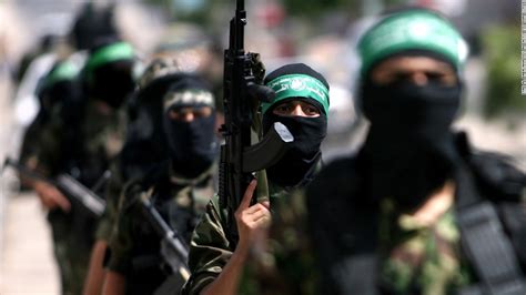 amnesty alleges hamas war crimes against palestinians cnn