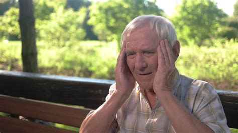 Old Man Holding Head Elderly Person Has Stock Footage SBV