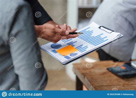 group of business people meeting for analysis data figures to plan business strategies business