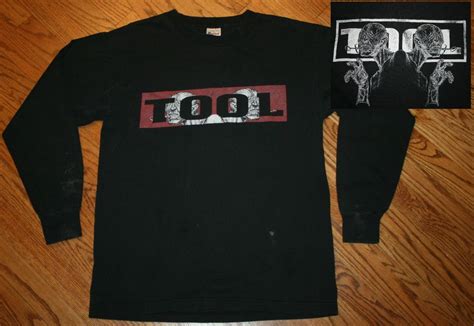 who designs tool band shirts hamilton befee1995