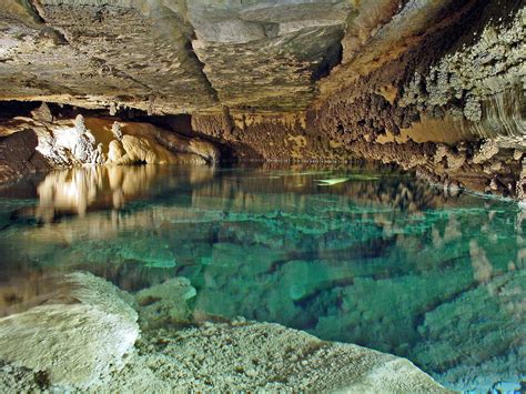 The Turquoise Lake Pictured Here Is A Highlight Of The Scenic Cave