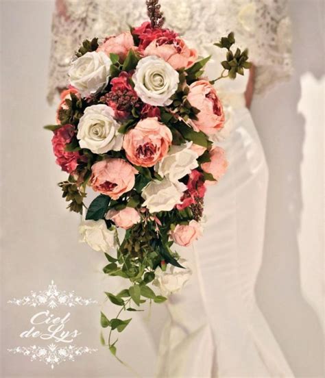 Intertwine them with coordinating ribbons and for a perfectly undone, natural look is naturally. how to make cascading bridal bouquets with silk flowers ...