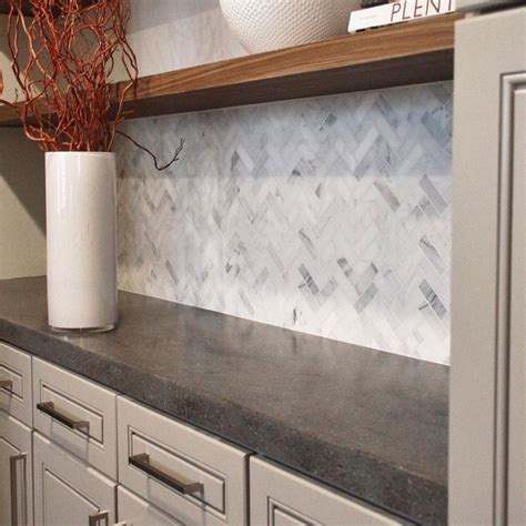 Herringbone tile pattern has been in use for hundreds of years because of its elegant and intriguing look. Asian Statuary Herringbone 1x3 Marble Tile | Herringbone ...