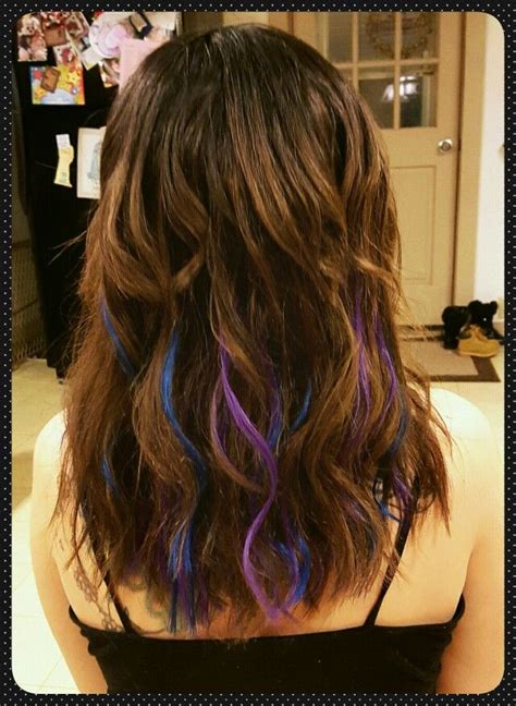 Getting highlights in blue color generally requires the same concept as with any other color. Purple and blue highlights on brown hair | Peekaboo hair ...