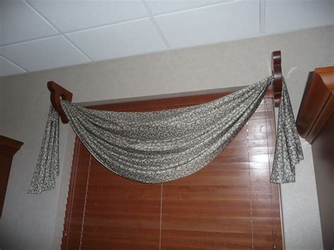 Measure the width of your window from one side to the other. Great idea for curtains. This is a wood curtain holder on ...