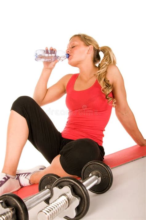 Young Girl At The Gym Drinking Water Stock Image Image Of Attractive