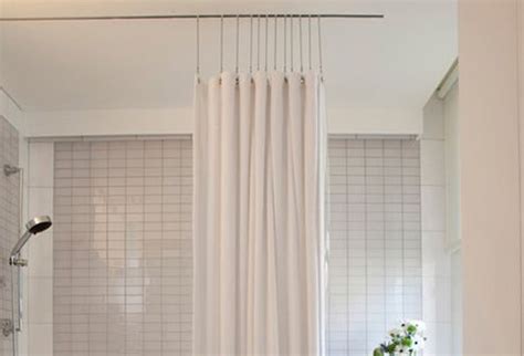 Some l shaped shower curtain rods have floor support which comes up and attaches to the rod. Ceiling mounted shower curtain track | Shower curtain ...