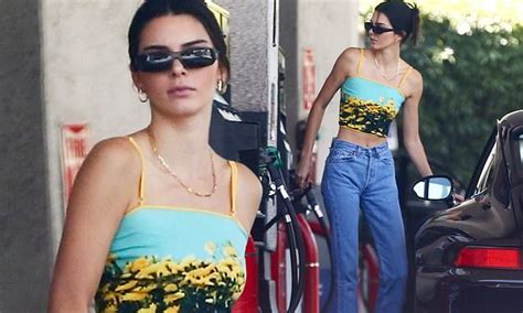 Kendall Jenner Flashes Her Toned Stomach In Tank Top As She Fuels Up