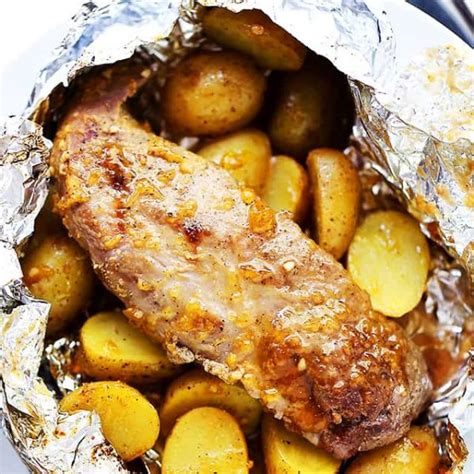 Place the pork loin on a sheet of tin foil and gently wrap the tin foil around the whole pork loin roast. Grilled Peach-Glazed Pork Tenderloin Foil Packet with Potatoes
