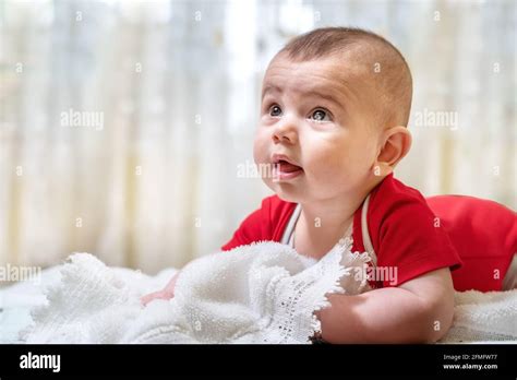 Child Laying On Stomach High Resolution Stock Photography And Images