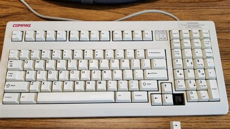 Cleaning out the server room at work, found this old mechanical keyboard. Cherry Brown keys, my ...