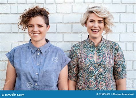Laughing Young Lesbian Couple Standing Together Outside Stock Image Image Of People Outdoors