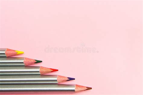 Colored Pencils On Pastel Pink Background Trend Colors Pattern Stock