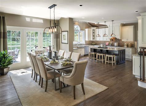 A Tasteful Kitchen And Living Room Area At The Preserve At Providence In Colle Open Concept