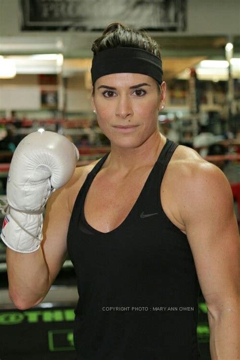 A Woman In Black Shirt And White Boxing Gloves