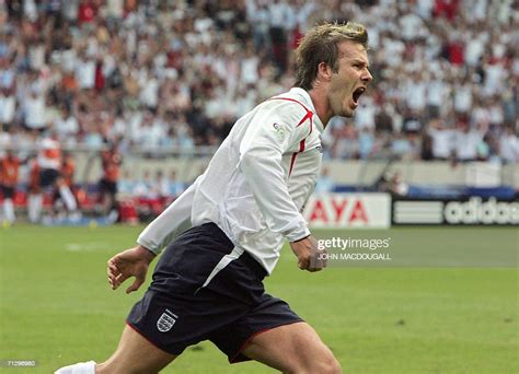 English Midfielder David Beckham Celebrates After Scoring The Games