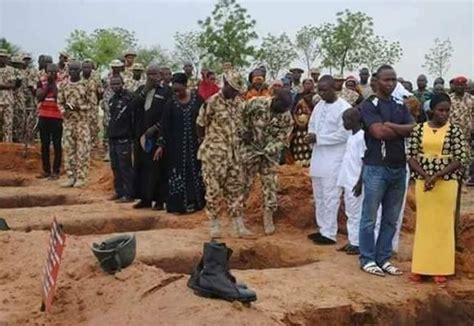Photos From The Mass Burial Of Nigerian Soldiers Killed By