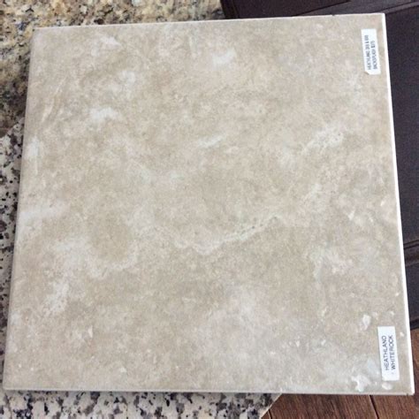 Install the first row of tiles then move on to the. "Heathland white rock" - 12" tile backsplash on the ...