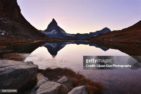 Matterhorn Reflected In Riffelsee Lake At Sunset Photos And Premium