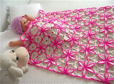What you're looking at here is a wholly unique 6 petal puff flower baby blanket, which is less a useful accessory and more a work of art in its own right! Ravelry: Princessa Baby Blanket pattern by LiliaCraftParty