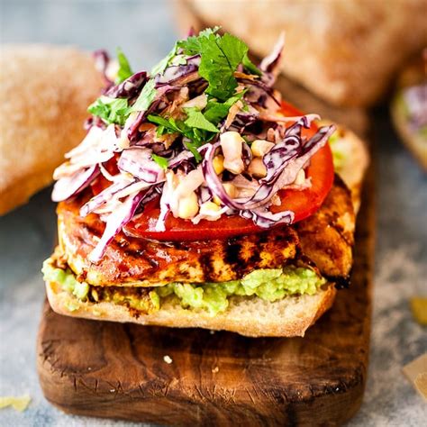 Lean ground chicken is amped up with canned green chiles and fresh cilantro for a moist, flavorful patty served with fixings on a sesame bun. Korean BBQ Grilled Chicken Burger Recipe • Salted Mint