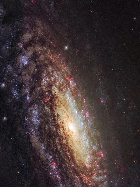 This Nasaesa Hubble Space Telescope Image Shows A Spiral Galaxy Known