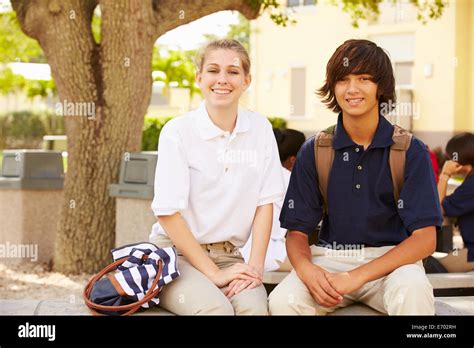 High School Students Wearing Uniforms On School Campus Stock Photo Alamy