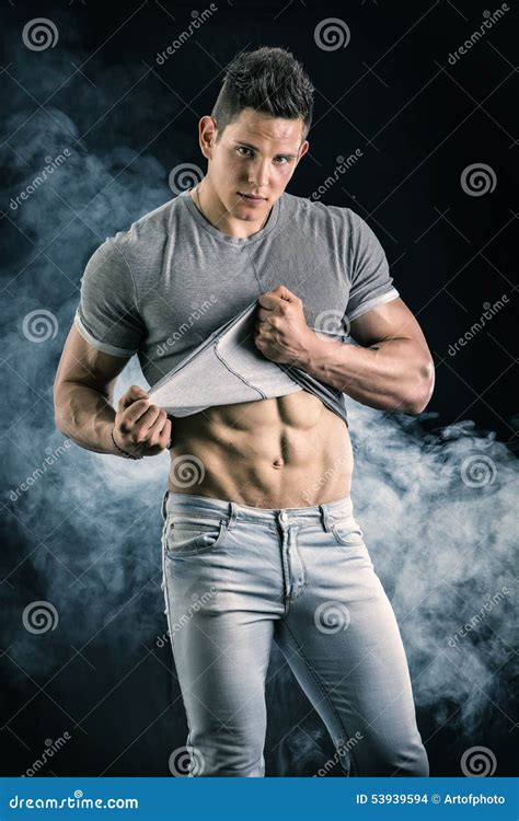 Handsome Fit Young Man Pulling Up T Shirt Stock Photo Image Of Adult