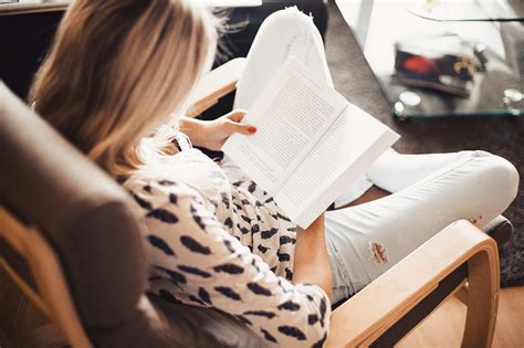 Woman Reading A Book In A Chair Free Stock Photo Picjumbo