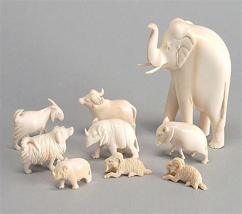 Lot Nine Ivory Animals An Elephant Four Goats A Boar Two