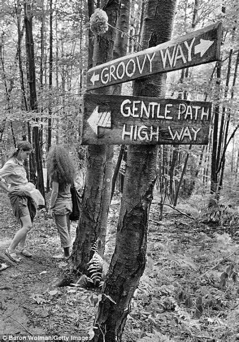 other photos showed signs pointing music lovers to the groovy way as if they… woodstock 1969