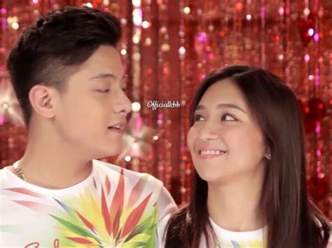 this is the handsome daniel padilla and the pretty kathryn bernardo smiling for the camera while