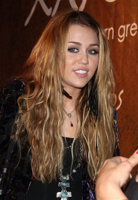 Popular Hairstyles For Girls Miley Cyrus Long Tousled Curly Hairstyle