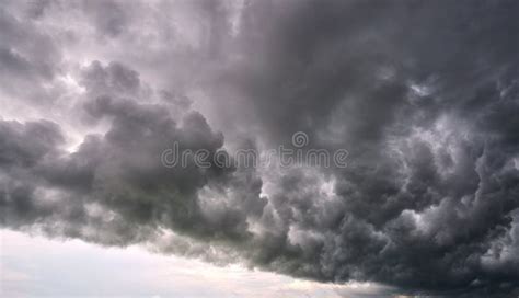 Landscape Of Dark Ominous Clouds Forming On Stormy Sky During Heavy