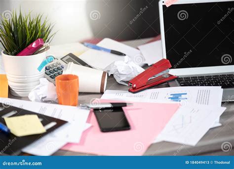 Messy And Cluttered Desk Stock Image Image Of Workplace 184049413