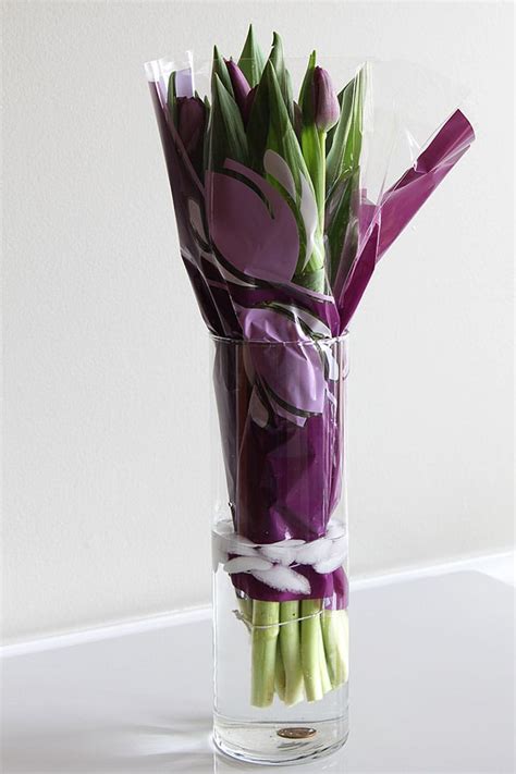 I have cut flowers most of the time and i always wonder what i can add after the store bought packet water needs to be replaced. Making Tulips Last Longer: No More Drooping - House of ...