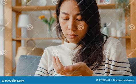 Sick Asian Young Woman Holding Pill Take A Look Medicine Sit On Couch At Home Woman Taking