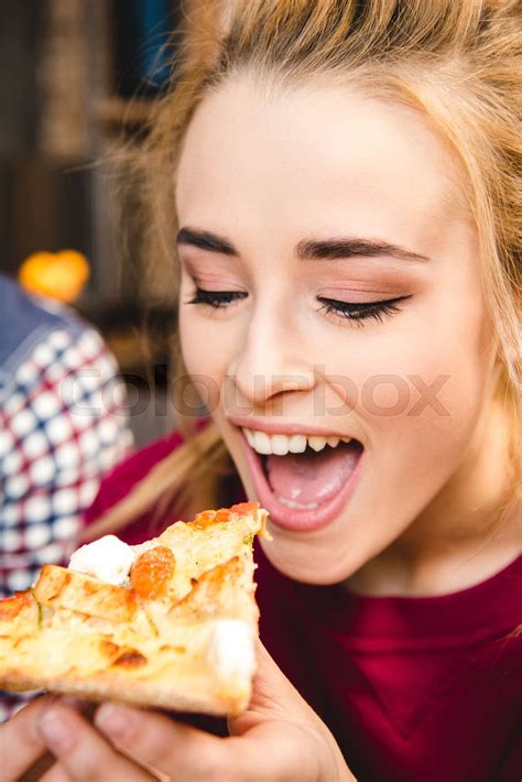 Woman Eating Pizza Stock Image Colourbox
