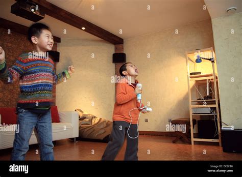 Two Boys Playing Games Stock Photo Alamy