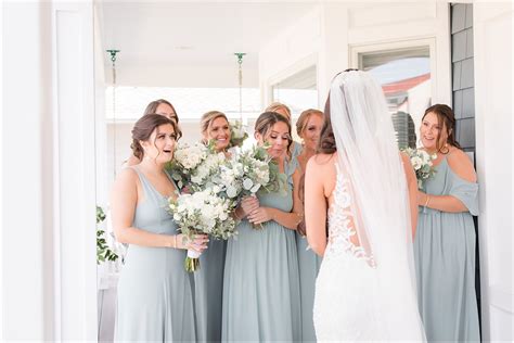 first look with bridesmaids getting ready photo ideas for wedding day